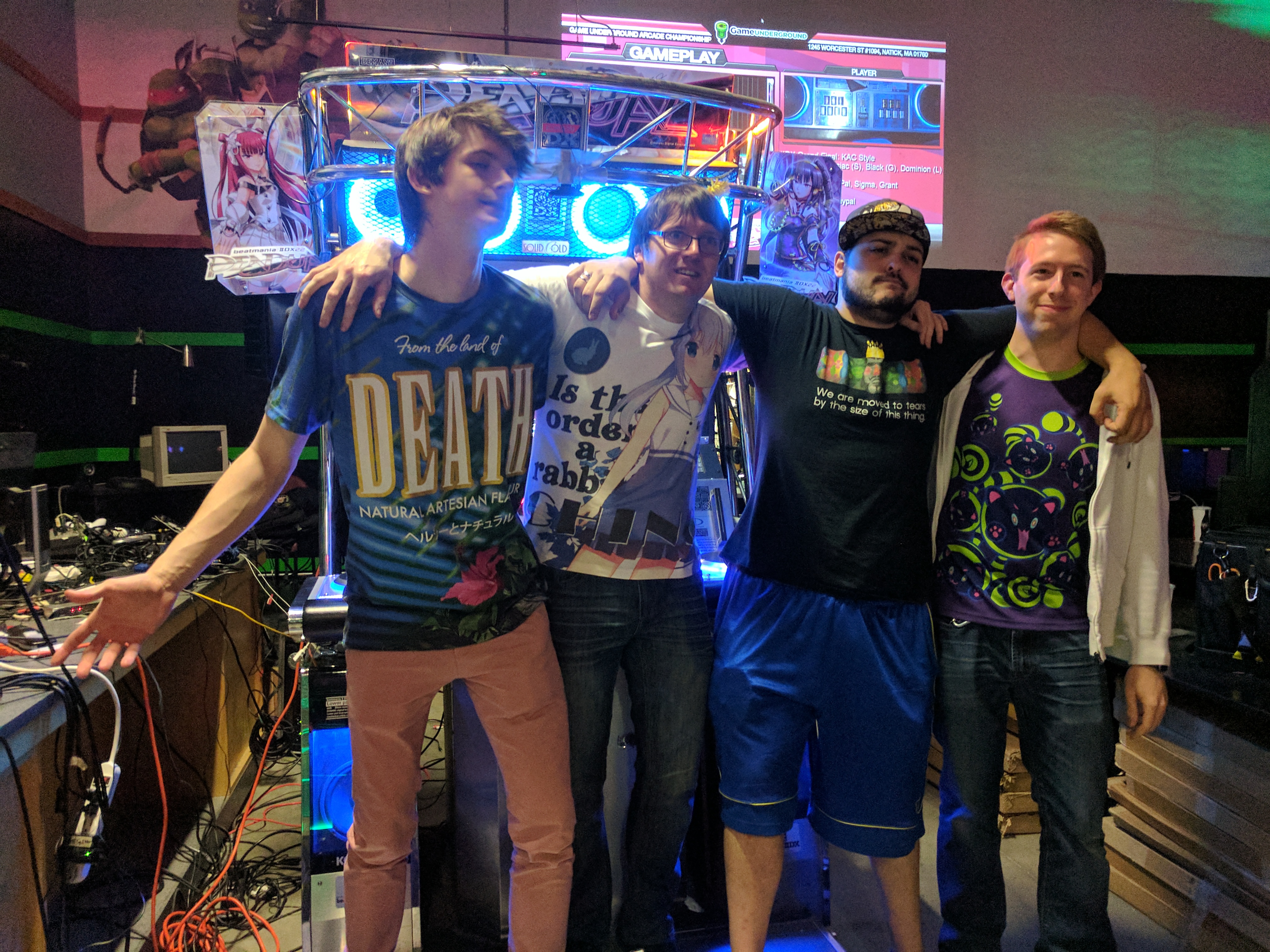 beatmania IIDX Top 4 winners left to right: PayPal (2nd), Grant (1st), Sigma (3rd), Light (4th)